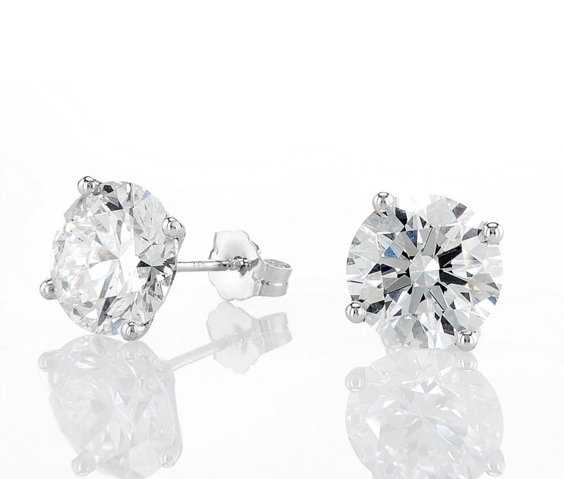 14kt White Gold 6.08ctw Diamond Earrings: Jewelry Description Description: One pair of 14k white gold earrings, set with lab grown diamonds. Jewelry Weight: 2.25 Grs Total Diamonds Weight: 6.08 Cts Precious Metal: 14kt White Gold Certificate 