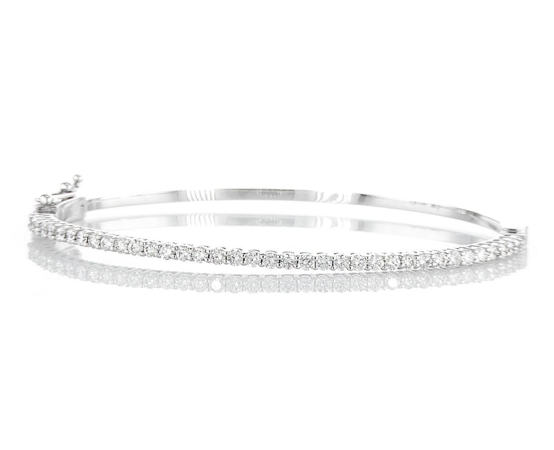 14kt White Gold 1.32ctw Diamond Bangle: Jewelry Description Description: One 14k white gold bangle, set with lab grown diamonds. Jewelry Weight: 9.19 Grs Total Diamonds Weight: 1.32 Cts Precious Metal: 14kt White Gold Certificate Number: DS
