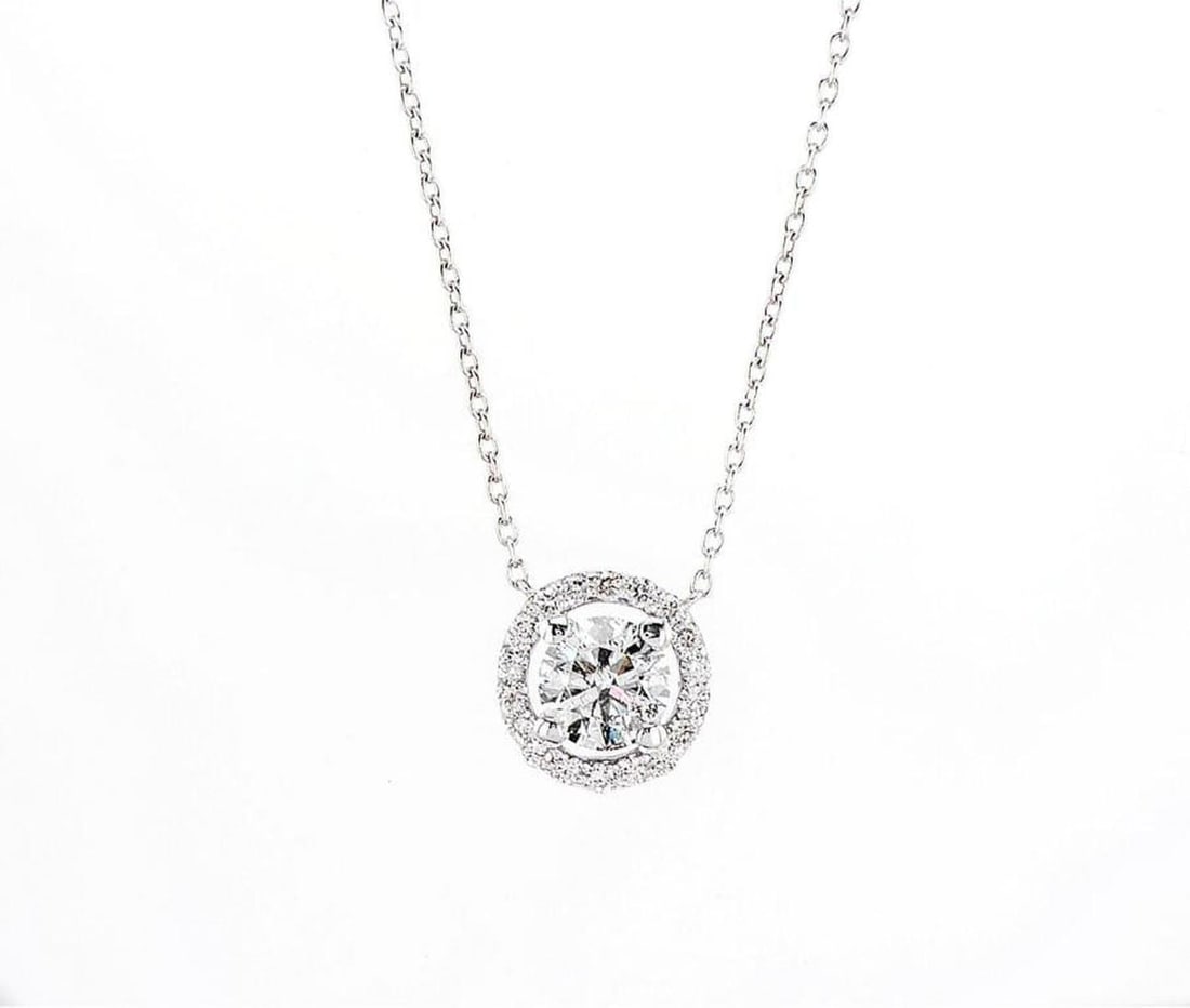 14kt White Gold 1.22ctw Diamond Pendant: Jewelry Description Description: One 14k white gold pendant, set with natural diamond. Jewelry Weight: 2.87 Grs Total Diamonds Weight: 1.22 Cts Precious Metal: 14kt White Gold Certificate Number: DSL-