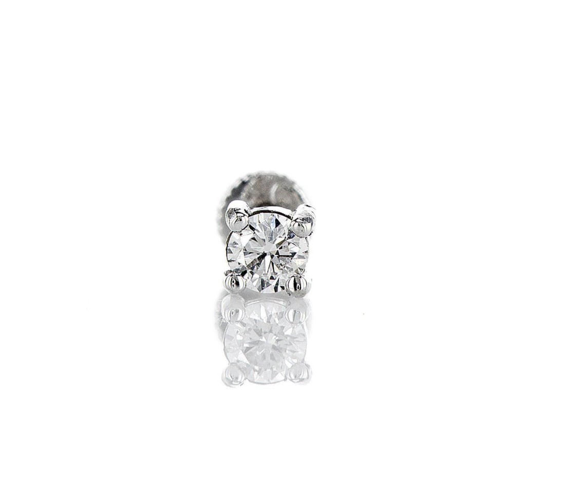 14kt White Gold 0.1ctw Diamond Earring: One 14k white gold earring, set with one lab grown diamond. Jewelry Weight: 0.3Grs Total Diamonds Weight: 0.1Cts Main Stones Description: Quantity: 1 Cut and shape: Round Brilliant Carats Weight: 0.1 