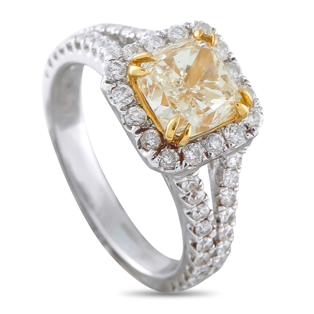 18K WHITE GOLD 2.97CT DIAMOND RING: This luxury ring is simply stunning. A 2.07 carat Diamond makes a sparkling statement at the center. The 18K White Gold setting is elevated by inset Diamonds totaling 0.90 carats, which surround the c