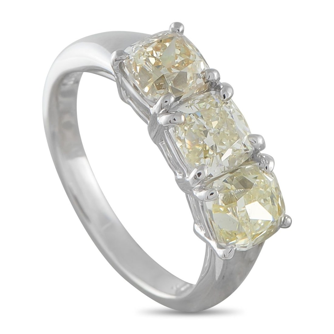 PLATINUM 3.26CT DIAMOND RING: A trio of sparkling Diamonds with a total weight of 3.26 carats shine brightly atop this simple, elegant ring. Crafted from Platinum, this understated piece is ideal for everyday wear. It features a 2
