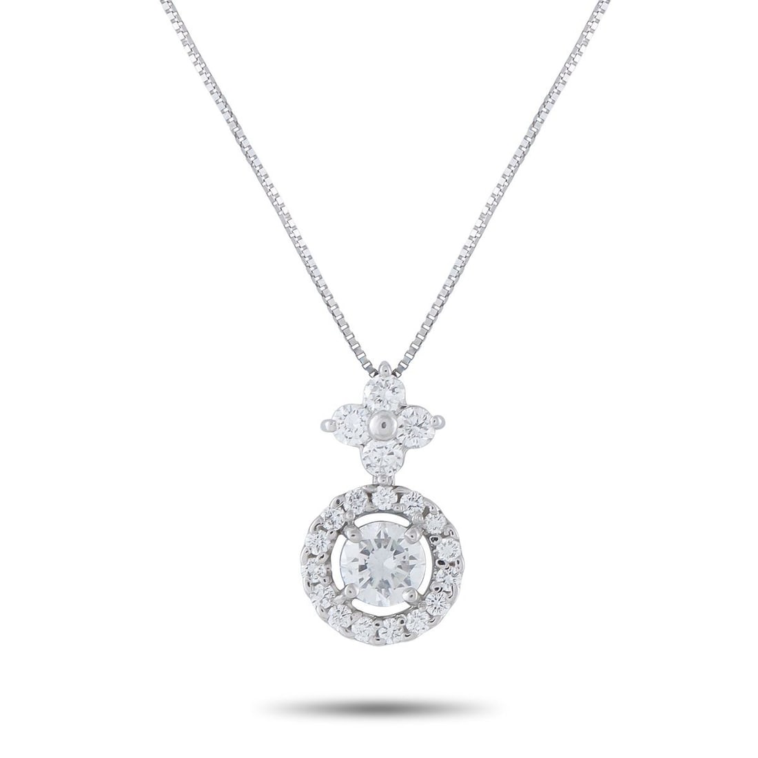 18K WHITE GOLD 0.95CT DIAMOND PENDANT NECKLACE: Add a touch of sparkle to any ensemble with this exquisite necklace. Simple and stylish, the 18K White Gold pendant is elevated by the 0.50 carat Diamond center stone and additional Diamond accents to