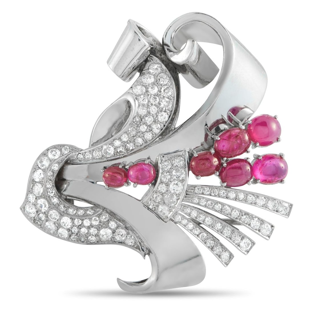 PLATINUM 2.10CT DIAMOND AND RUBY RETRO BROOCH: Designed like a stylized bouquet or floral spray, this platinum brooch features large, sweeping curves of platinum that wind around a cluster of vibrant ruby cabochon buds. The contrast between the sm