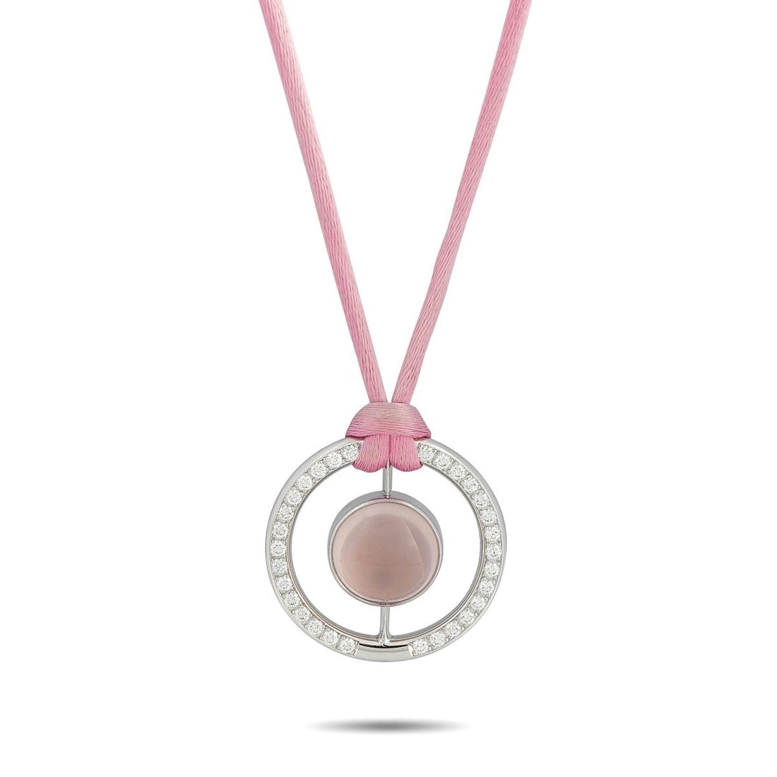 BUCHERER 18K WHITE GOLD 1.11CT DIAMOND AND ROSE QUARTZ CORD NECKLACE: This Bucherer necklace is simply unforgettable. Perfect for anyone who loves the color pink, a stunning Rose Quartz gemstone is suspended at the center of a circular 18K White Gold pendant. The pendan
