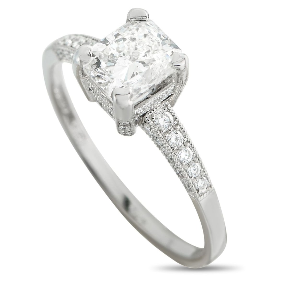 PLATINUM 1.21CT DIAMOND RING: This luxury ring is designed to effortlessly catch the light. The detailed Platinum setting features dazzling inset Diamonds with a total weight of 0.25 carats. At the center, a 0.96 carat Diamond ser