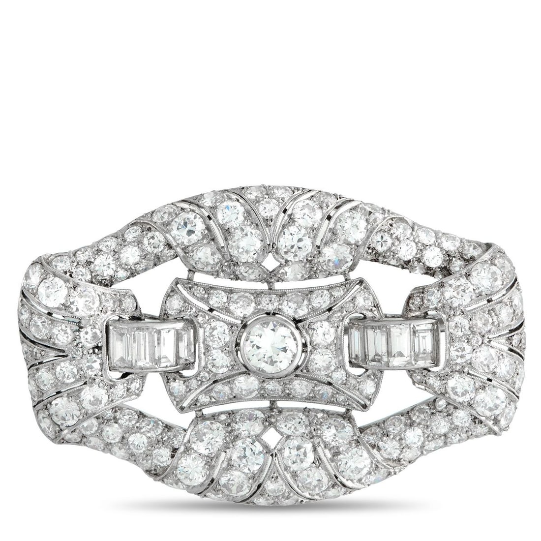 PLATINUM 5.04CT DIAMOND ART DECO BROOCH: Rooted in the decorative language of the Art Deco period, this platinum brooch presents a buckle-like profile measuring 1.38 by 2 inches. Diamonds totaling 5.04 carats trace the form, defining its out