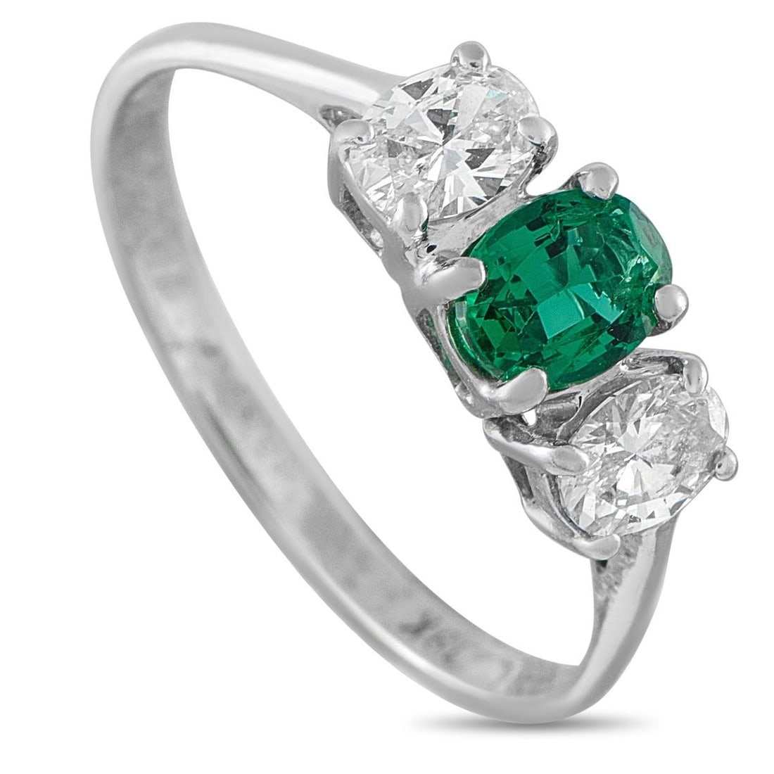 18K WHITE GOLD LAB-GROWN DIAMOND AND EMERALD RING: This exquisite ring will add a stylish pop of color to any ensemble. Set in 18K White Gold, the classic three-stone design includes sparkling lab-grown diamonds and an emerald center stone. A 1mm wide