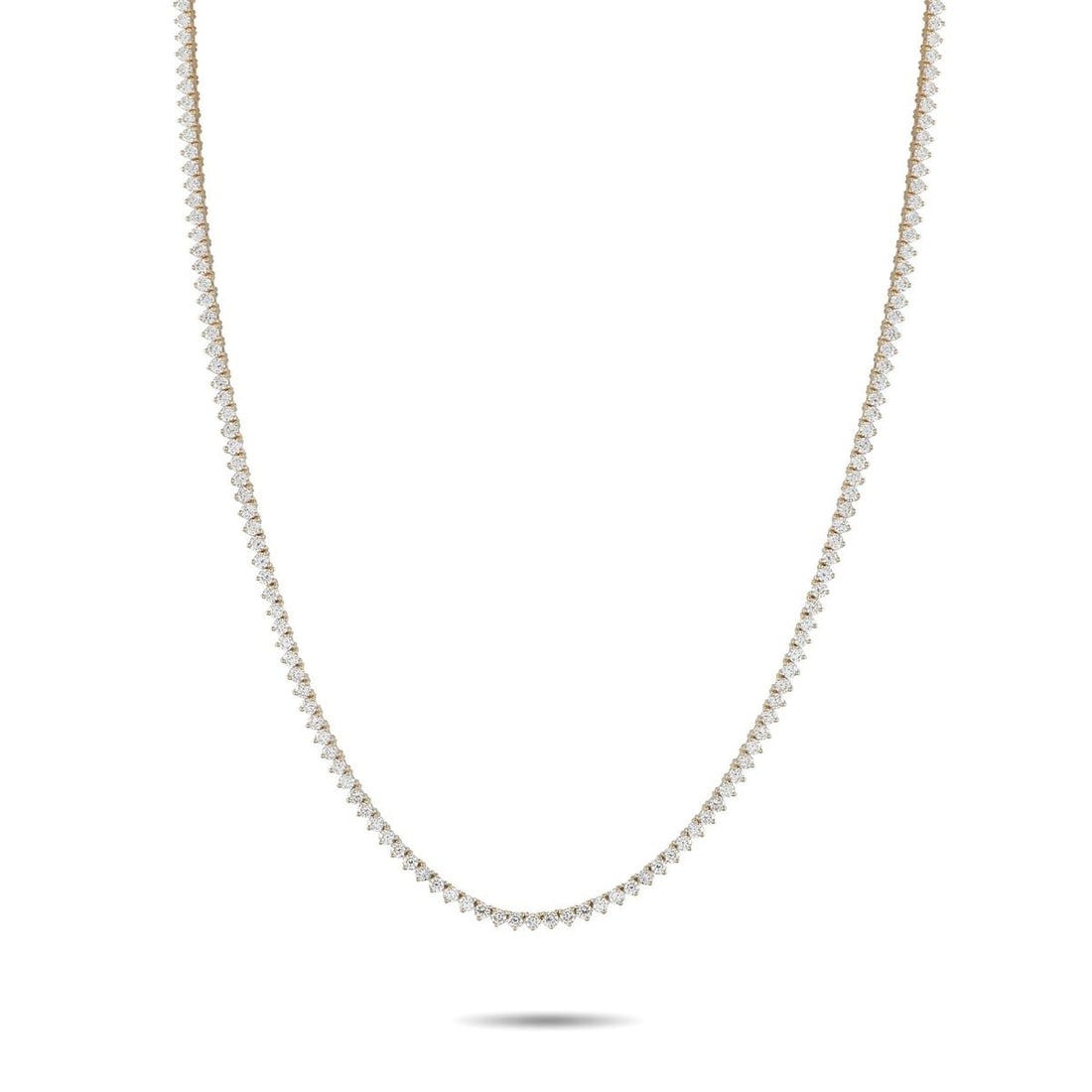 14K YELLOW GOLD 7.25CT LAB-GROWN DIAMOND TENNIS NECKLACE: Add a touch of timeless elegance to any ensemble with this impeccably crafted tennis necklace. Made with a simple 14K Yellow Gold setting, a series of sparkling Lab Grown Diamonds totaling 7.25 carats