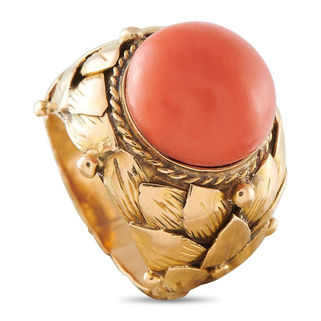 18K ROSE GOLD CORAL RING: Classically elegant details make this ring instantly captivating. Set in 18K Rose Gold, the detailed setting comes to life thanks to charming leaf motifs. A vibrant Coral cabochon adds a stylish pop o