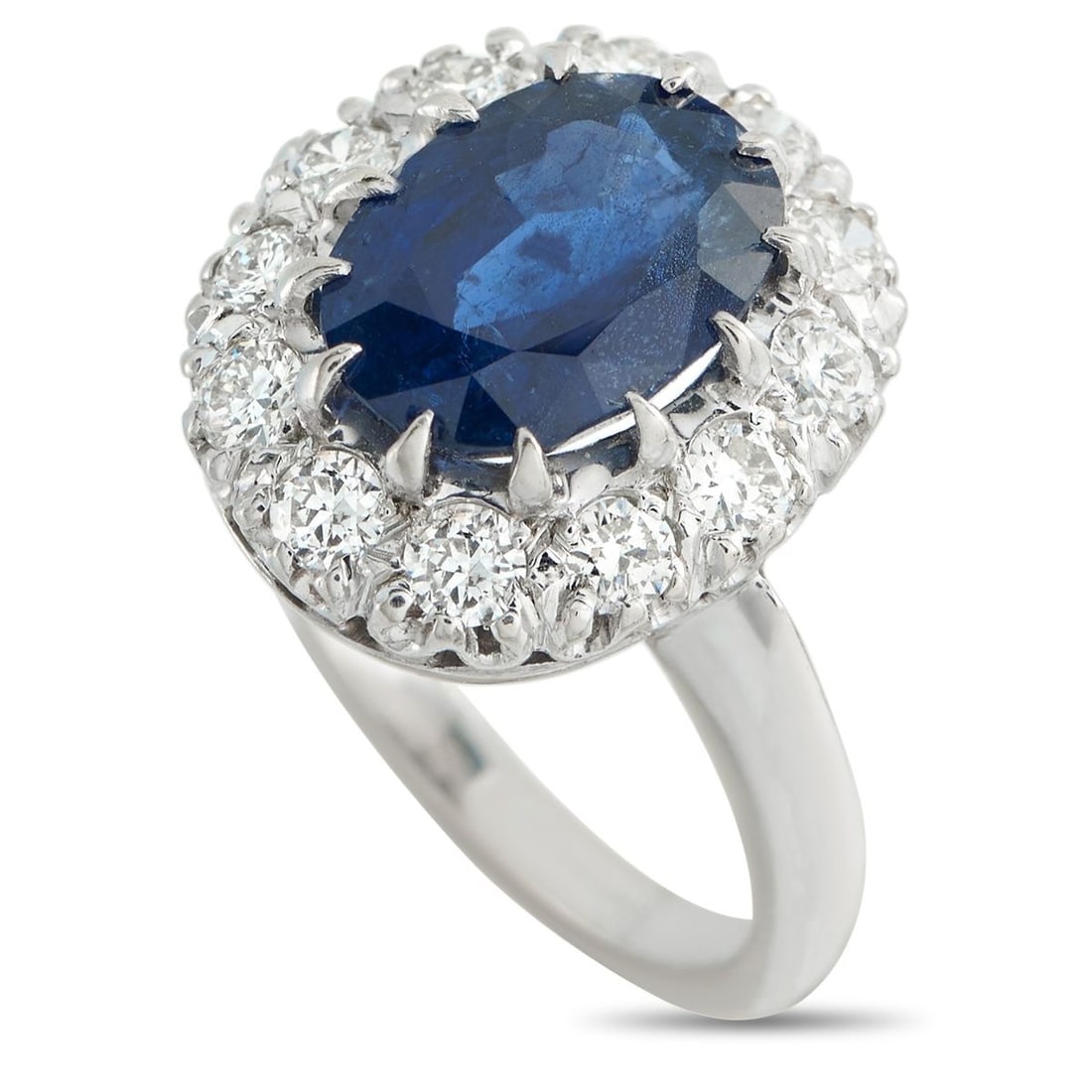 14K WHITE GOLD 0.60CT DIAMOND AND SAPPHIRE RING: This exquisitely crafted ring is nothing short of breathtaking. A 3.45 carat Sapphire makes a statement at the center of the design, while Diamond accents totaling 0.60 carats offer endless sparkle. S
