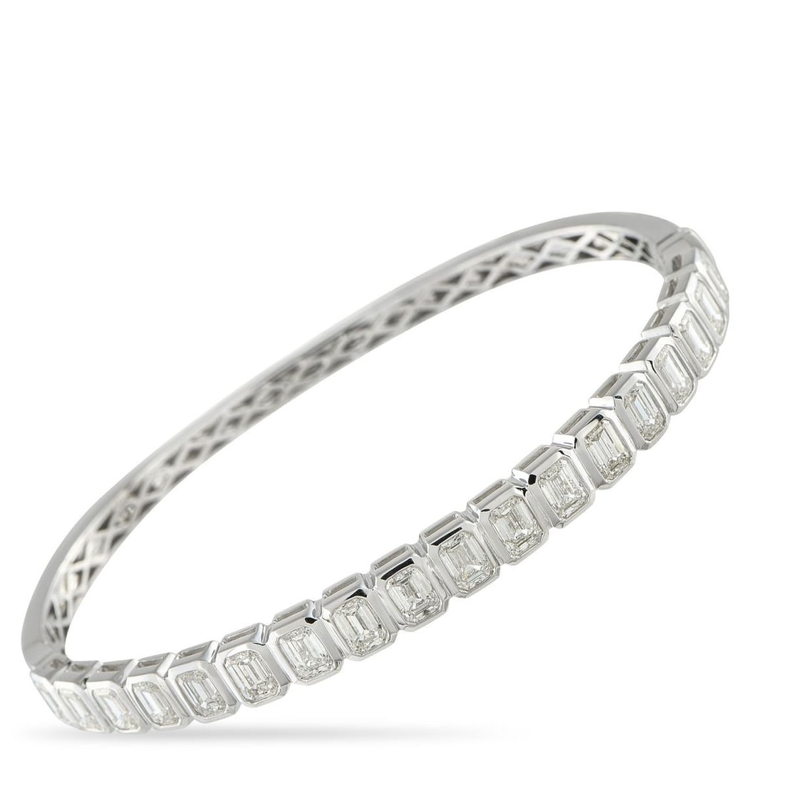 18K WHITE GOLD 5.90CT DIAMOND BRACELET: This bangle bracelet will add a touch of luxury to any ensemble. A simple 18K White Gold setting offers understated elegance, while sparkling Diamonds with a total weight of 5.90 carats make it imposs
