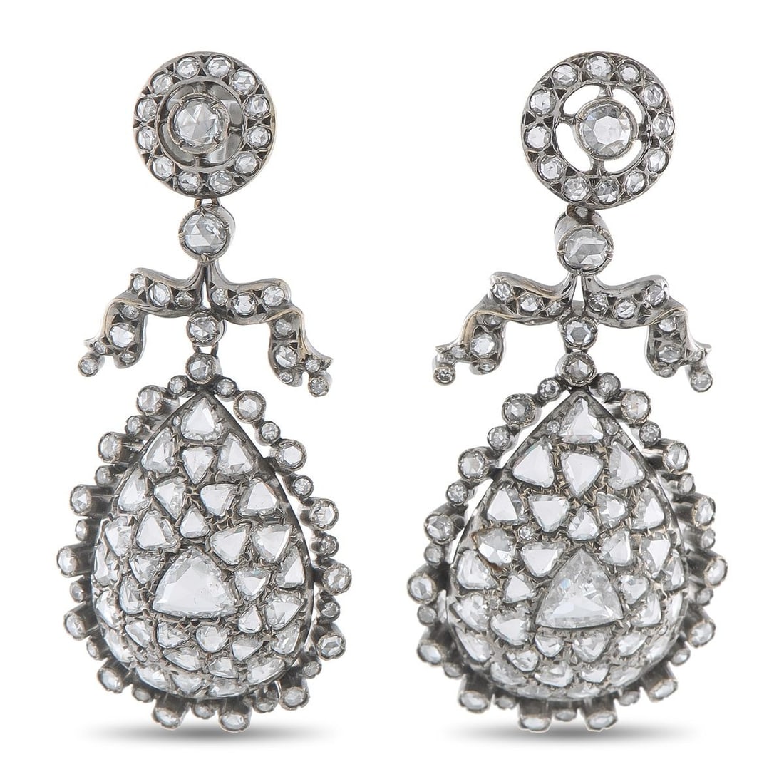 FRED LEIGHTON 18K WHITE GOLD 8.37CT DIAMOND EARRINGS: Incredibly ornate, these Fred Leighton earrings feature a classically elegant design that will continually captivate. Every dynamic detail is elevated by inset Diamonds totaling 8.37 carats. Set in 18