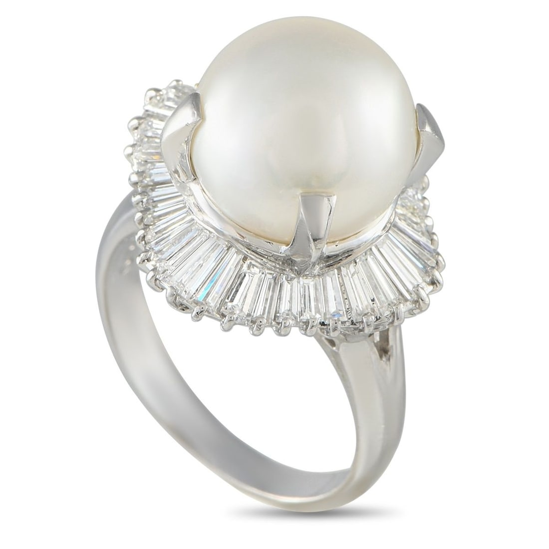 PLATINUM 1.69CT DIAMOND AND PEARL RING: This impressive ring is uniquely elegant in design. On this exciting accessory, a Pearl center stone is surrounded by a sparkling halo of Diamonds totaling 1.69 carats. This pieces Platinum setting fe