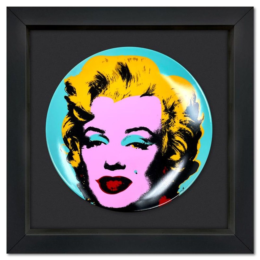Andy Warhol (1928-1987), "Marilyn (Blue)" Framed Limoges Porcelain Plate.: Marilyn (Blue) is a Limoges porcelain plate bearing the plate signature inverso of Andy Warhol (1928-1987). This plate is custom framed and floated on linen. Measures approx. 13.5" x 13.5" (frame), 8.