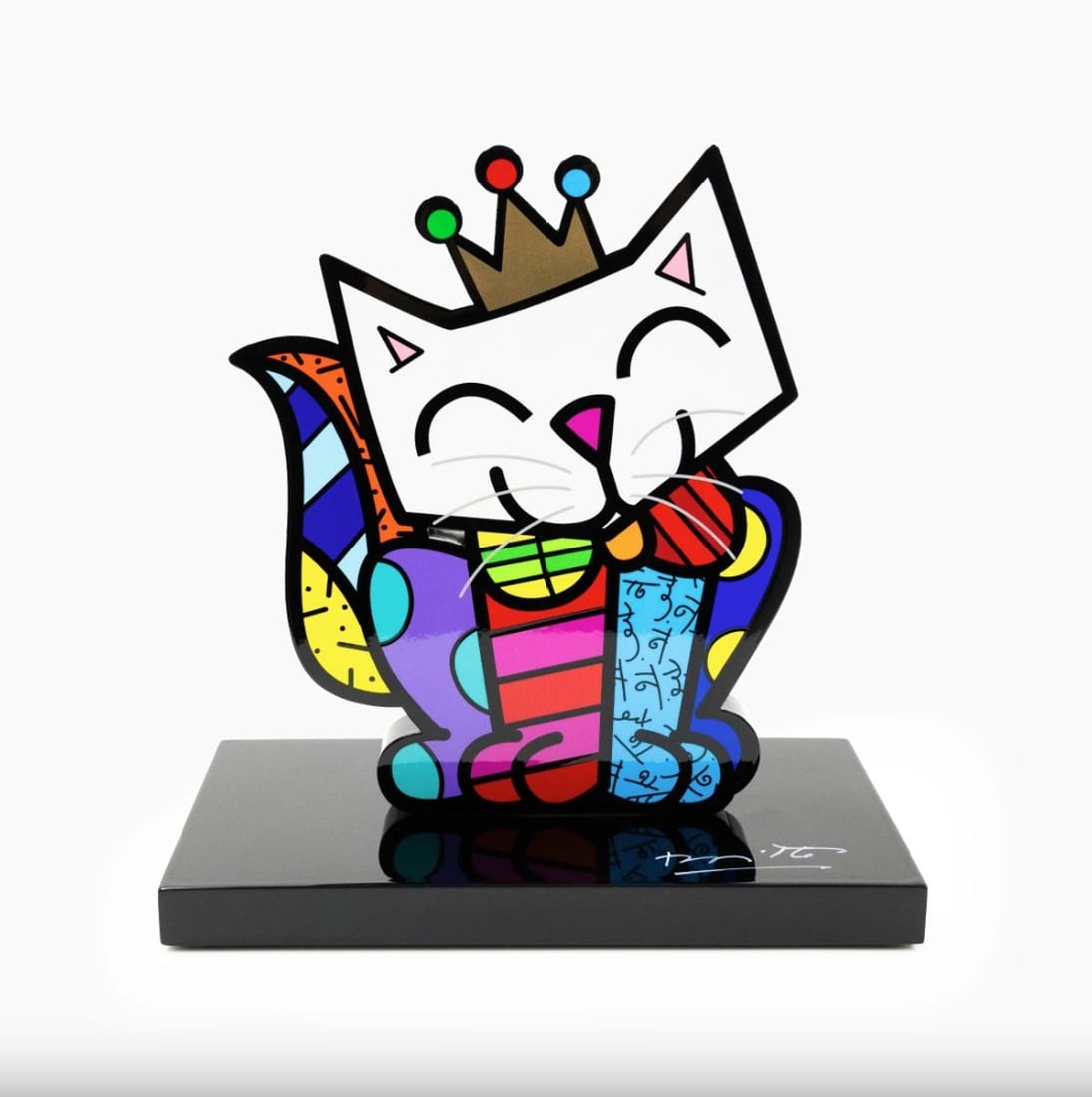 Romero Britto- Resin Sculpture with Hand Embellishments "Cat": Artist: Romero Britto. Medium: Resin Sculpture with Hand Embellishments. Title: Cat. Size: 9.13" x 4.62". Signature: Hand signed by the artist and includes an exclusive hologram. Certificate of Authen