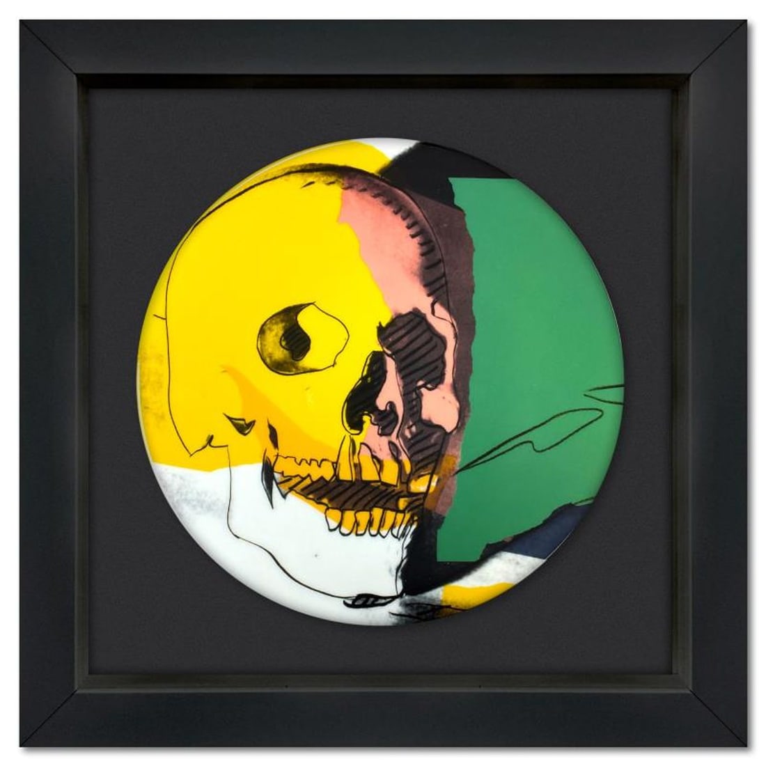 Andy Warhol (1928-1987), "SKULL (Yellow/Pink)" Framed Limoges Porcelain Plate.: SKULL (Yellow/Pink) is a Limoges porcelain plate bearing the plate signature inverso of Andy Warhol (1928-1987). This plate is custom framed and floated on linen. Measures approx. 13.5" x 13.5" (frame
