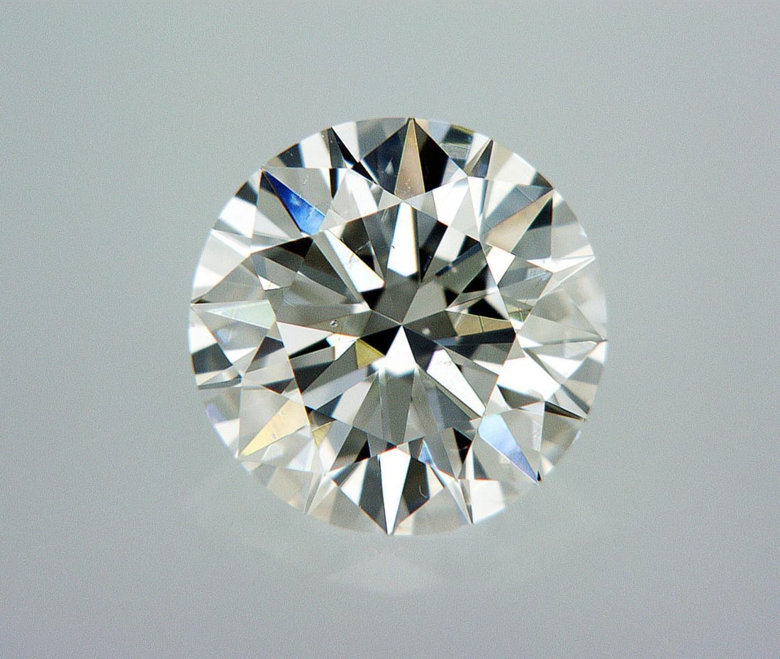 Natural 0.7 ct, Color D/SI1 GIA Graded Diamond: Lab/Natural Diamond: Natural Carat Weight: 0.7 Color Grade: D Clarity Grade: SI1 Model: Round Brilliant Fluorescence: Medium Blue Polish: Excellent Symmetry: Good Size: 5.62 - 5.69 X 3.49 Certificate 