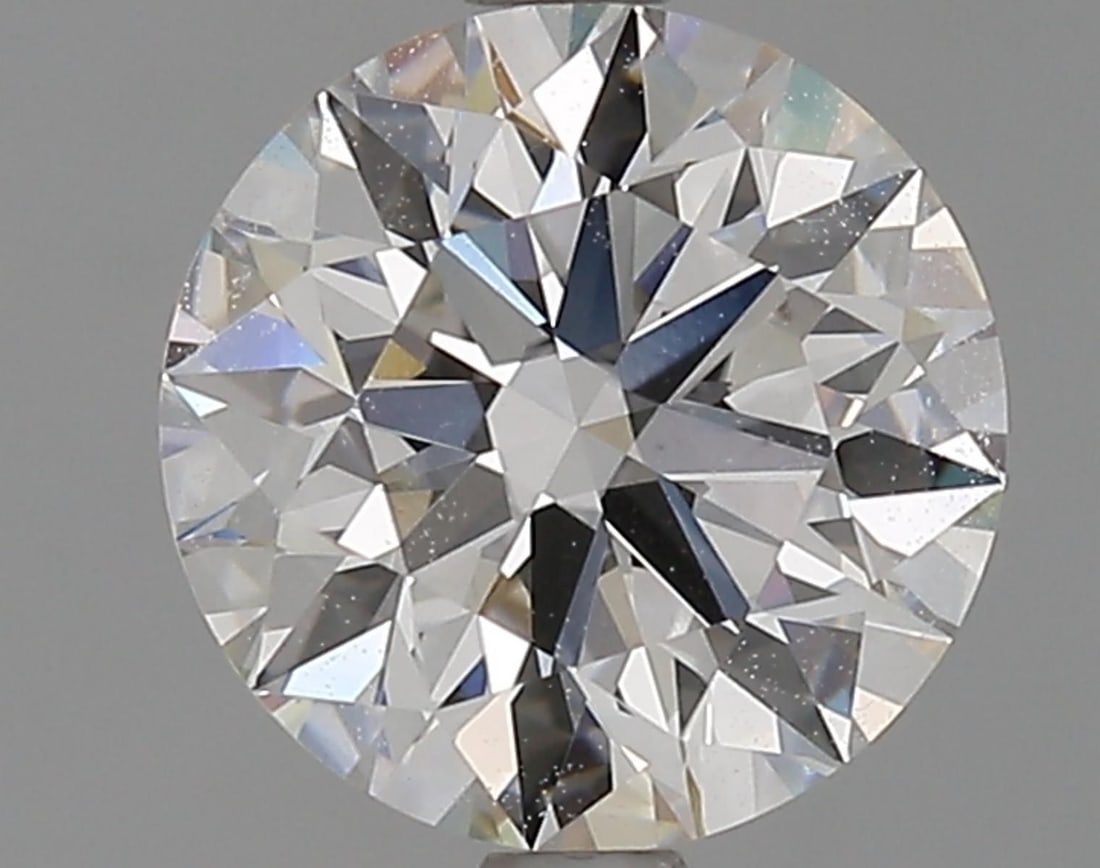 Lab Grown 2.01 ct, Color G/VS1 IGI Graded Diamond: Lab/Natural Diamond: Lab Carat Weight: 2.01 Color Grade: G Clarity Grade: VS1 Model: Round Brilliant Fluorescence: None Polish: Excellent Symmetry: Excellent Cut Grade: Ideal Size: 8.04 - 8.08 X 5.01 