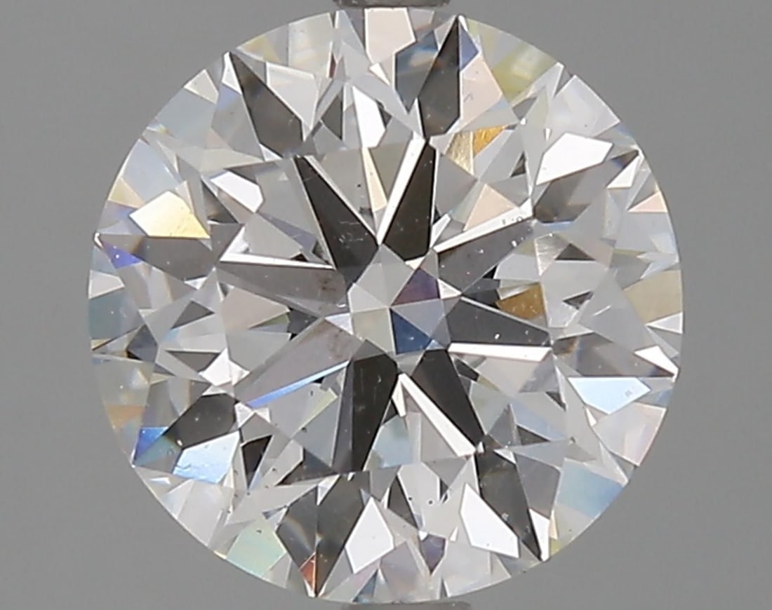 Lab Grown 2.93 ct, Color E/VS1 IGI Graded Diamond: Lab/Natural Diamond: Lab Carat Weight: 2.93 Color Grade: E Clarity Grade: VS1 Model: Round Brilliant Fluorescence: None Polish: Excellent Symmetry: Excellent Cut Grade: Ideal Size: 9.06 - 9.15 X 5.65 