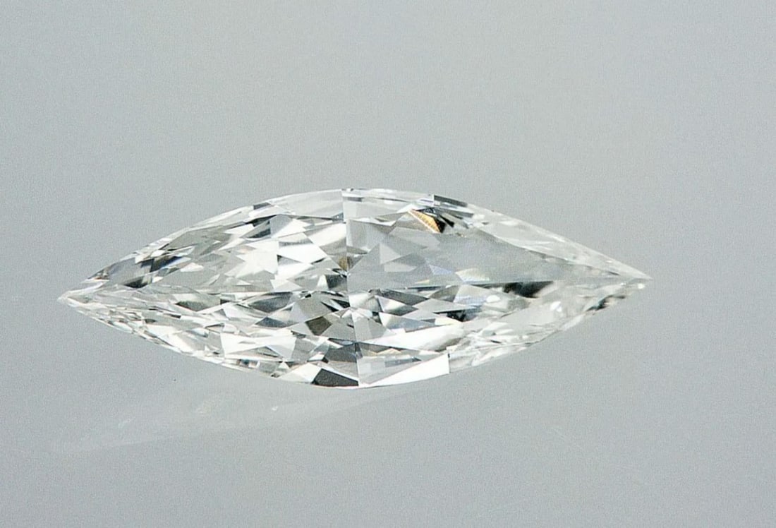 Lab Grown 1.51 ct, Color E/VS1 IGI Graded Diamond: Lab/Natural Diamond: Lab Carat Weight: 1.51 Color Grade: E Clarity Grade: VS1 Model: MARQUISE Fluorescence: None Polish: Excellent Symmetry: Excellent Depth: 61.4 Table: 60 Size: 11.4-6.14*3.77 Certif