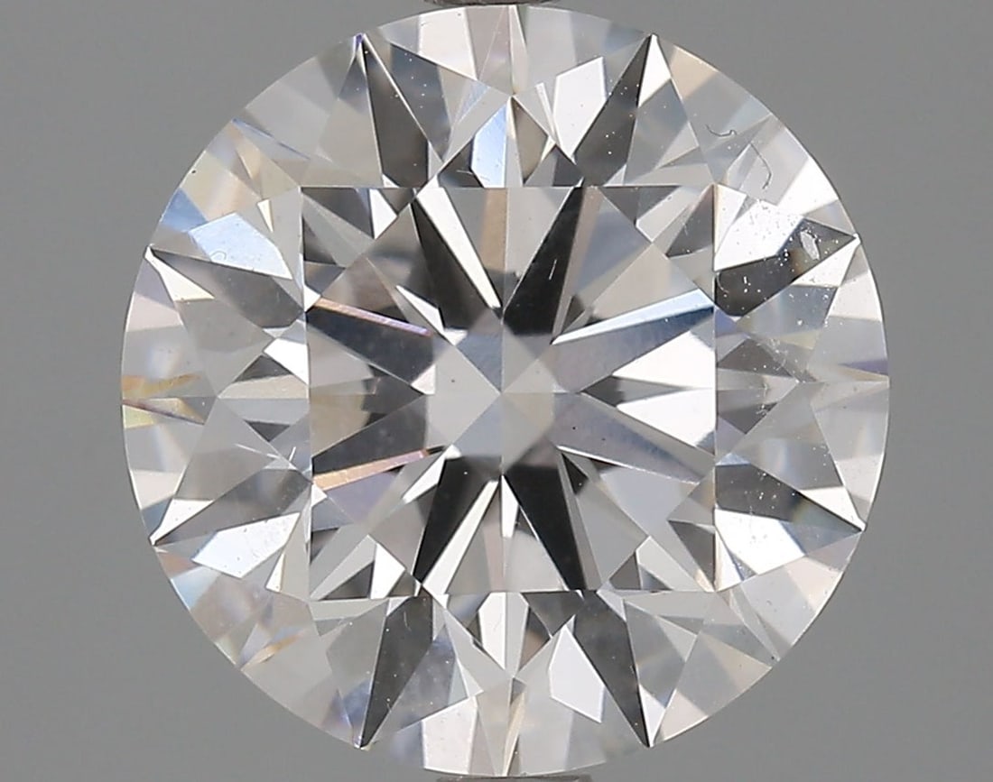 Lab Grown 3.6 ct, Color E/VS1 IGI Graded Diamond: Lab/Natural Diamond: Lab Carat Weight: 3.6 Color Grade: E Clarity Grade: VS1 Model: Round Brilliant Polish: Excellent Symmetry: Excellent Cut Grade: Ideal Size: 9.73 - 9.78 X 6.07 Certificate Number: 