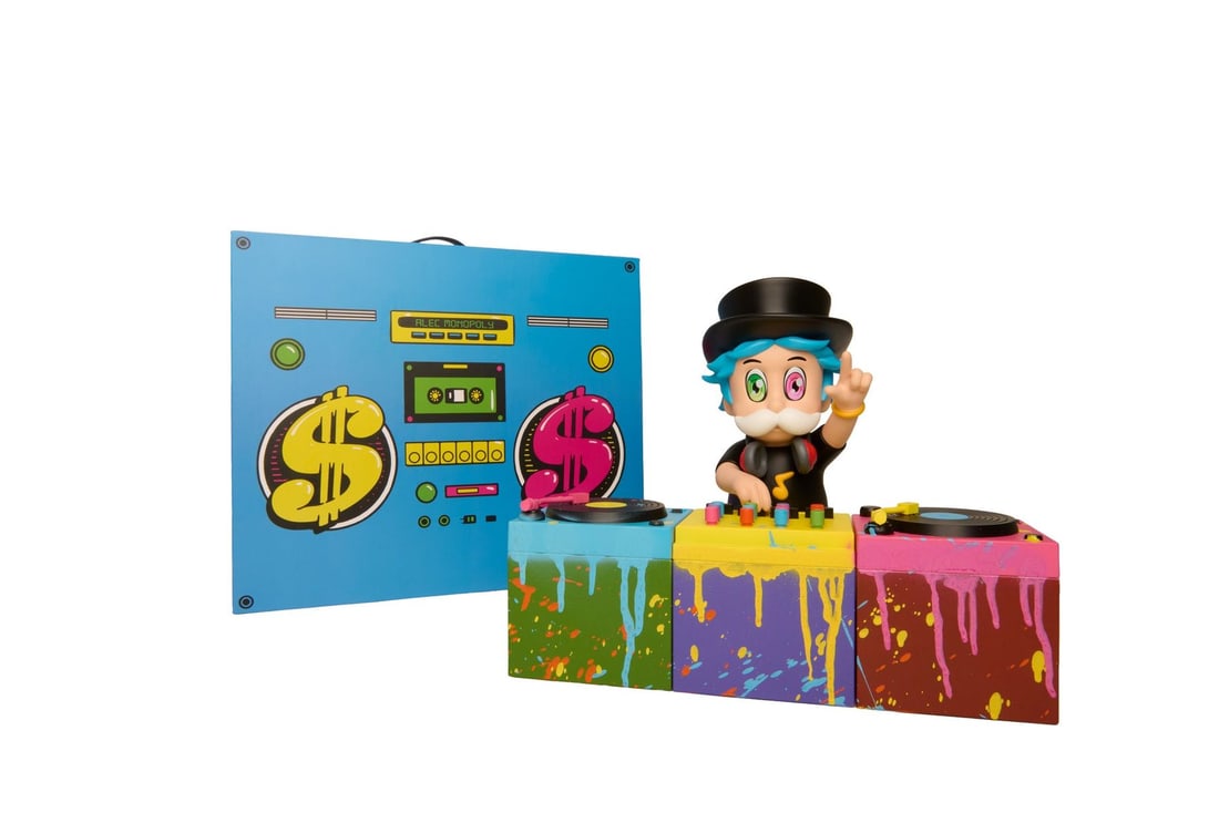 Alec Monopoly- Hand Painted Cast Vinyl "DJ Monopz": Artist: Alec Monopoly. Medium: Hand Painted Cast Vinyl. Title: DJ Monopz. Size: 14" x 11". Signature: Hand signed and numbered. Certificate of Authenticity: Is included. Additional: Edition of 200.