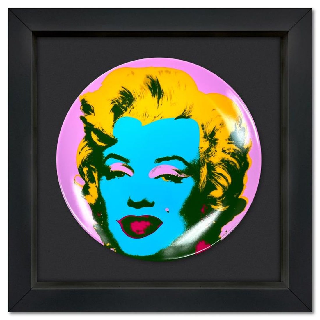 Andy Warhol (1928-1987), "Marilyn (Purple)" Framed Limoges Porcelain Plate.: Marilyn (Purple) is a Limoges porcelain plate bearing the plate signature inverso of Andy Warhol (1928-1987). This plate is custom framed and floated on linen. Measures approx. 13.5" x 13.5" (frame), 