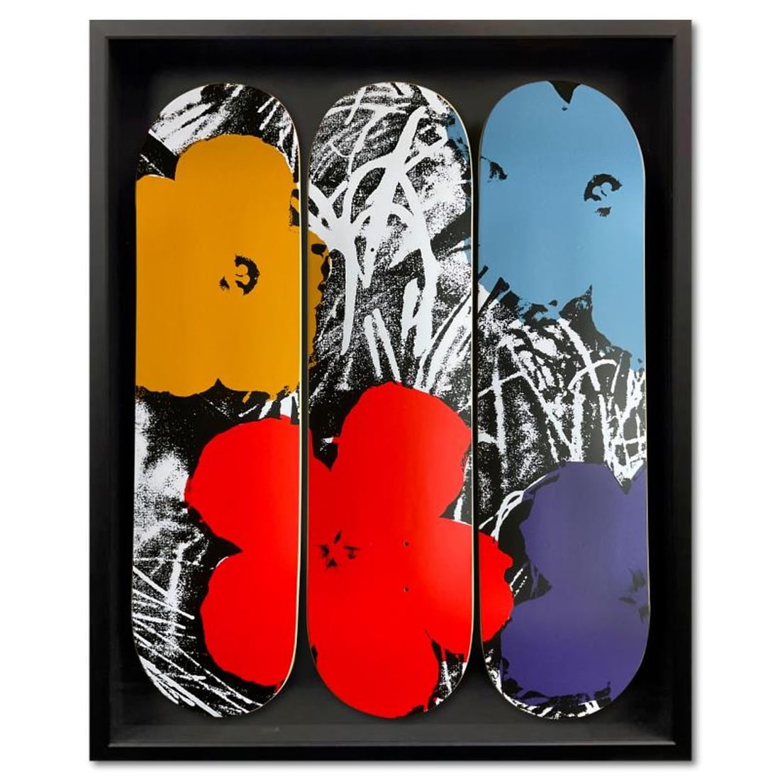 Warhol (1928-1987), "Flowers - Grey/Red" Framed Limited Edition Skateboard Triptych, Plate Signed: Flowers - Grey/Red is a limited edition skateboard triptych by Warhol (1928-1987), numbered and bearing the plate signature of the artist inverso. This triptych comes custom framed. Includes Letter