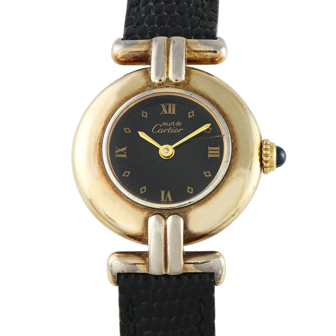 CARTIER MUST DE CARTIER COLISE BLACK DIAL VERMEIL QUARTZ WATCH: From the golden age of 1980s-90s Cartier, this Must Colise displays elegance with its black dial, Roman numerals, and kite-shaped hour markers. Gold-toned sword hands track the time. The 24mm x 5.5mm 