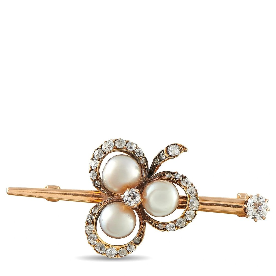 ANTIQUE 15K ROSE GOLD 0.65CT DIAMOND AND PEARL BROOCH: This antique English brooch is crafted in 15K rose gold and designed as a clover of natural pearls, each measuring 6.1mm to 6.65mm, framed by old mine-cut diamonds totaling approximately 0.65 carats a