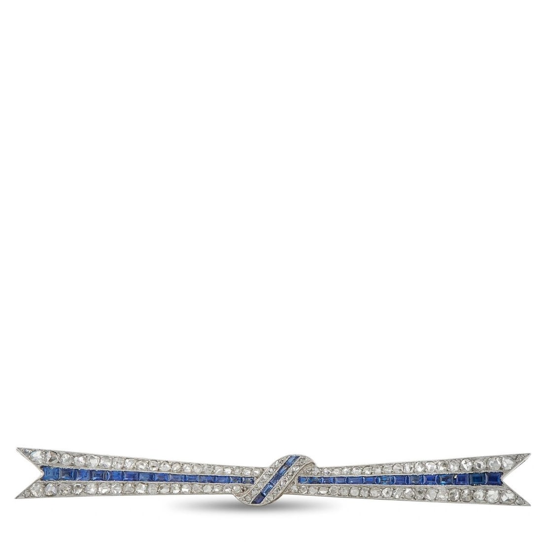 18K WHITE GOLD 2.10CT DIAMOND AND SAPPHIRE ART DECO BOW BROOCH: This French Art Deco brooch is crafted in 18K white gold in a stylized ribbon bow motif, pave-set with rose-cut diamonds totaling approximately 2.10 carats and channel-set sapphires totaling approxima