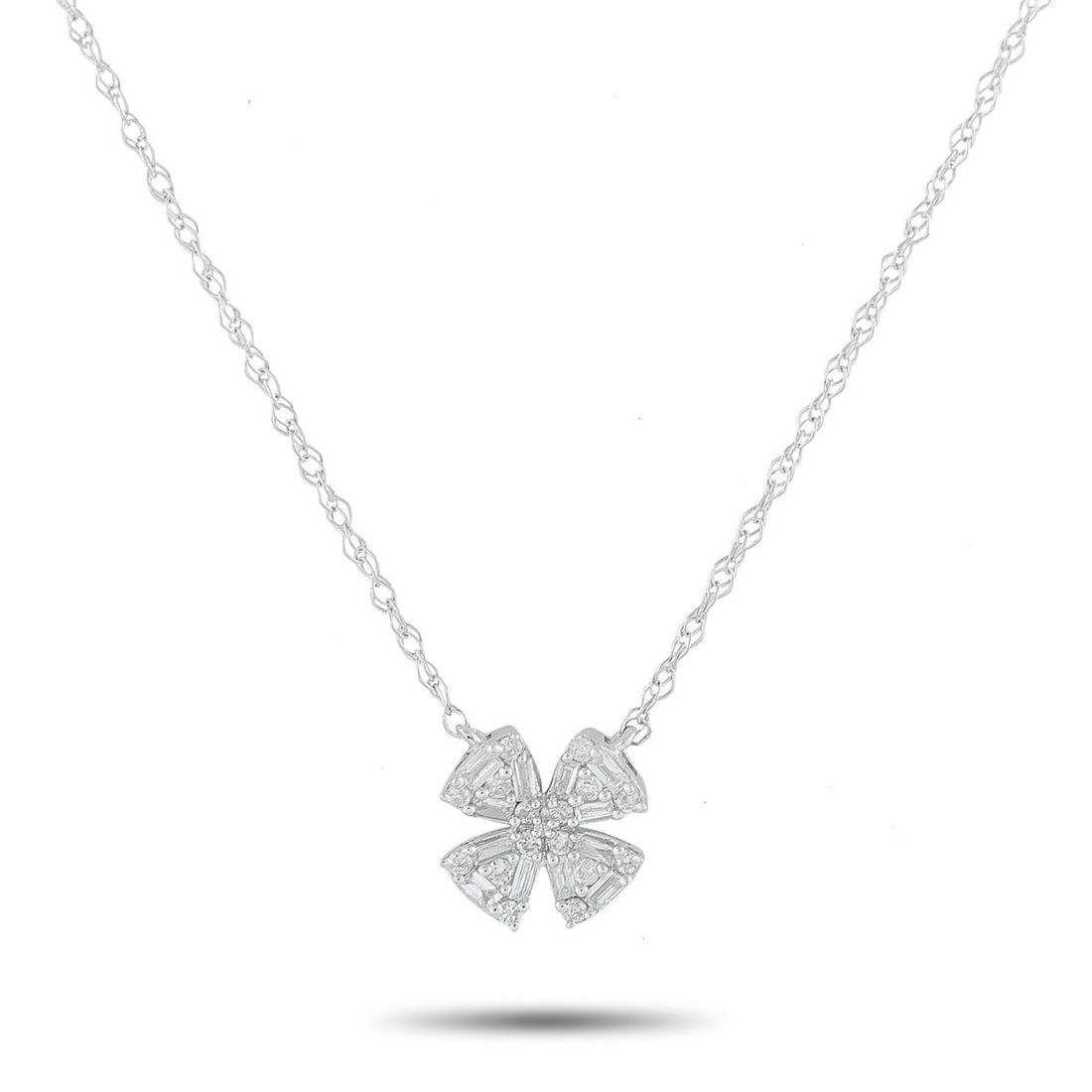 14K WHITE GOLD 0.20CT DIAMOND PENDANT NECKLACE: A clover-shaped pendant makes this 14K White Gold necklace a charming addition to any ensemble. Accented by Diamonds totaling 0.20 carats, the pendant measures 0.32 round and is suspended from an 18 c
