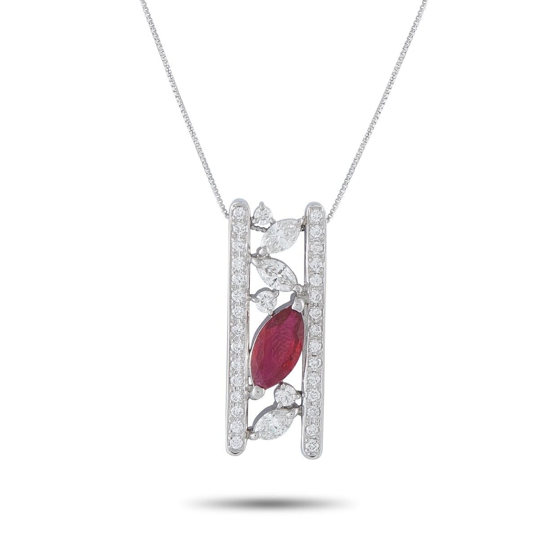 PLATINUM 1.12CT DIAMOND AND RUBY NECKLACE: This luxury necklace will elevate any ensemble. Set in Platinum, the dramatic pendant features a unique, openwork design that comes to life thanks to sparkling Diamonds totaling 1.12 carats. A single 