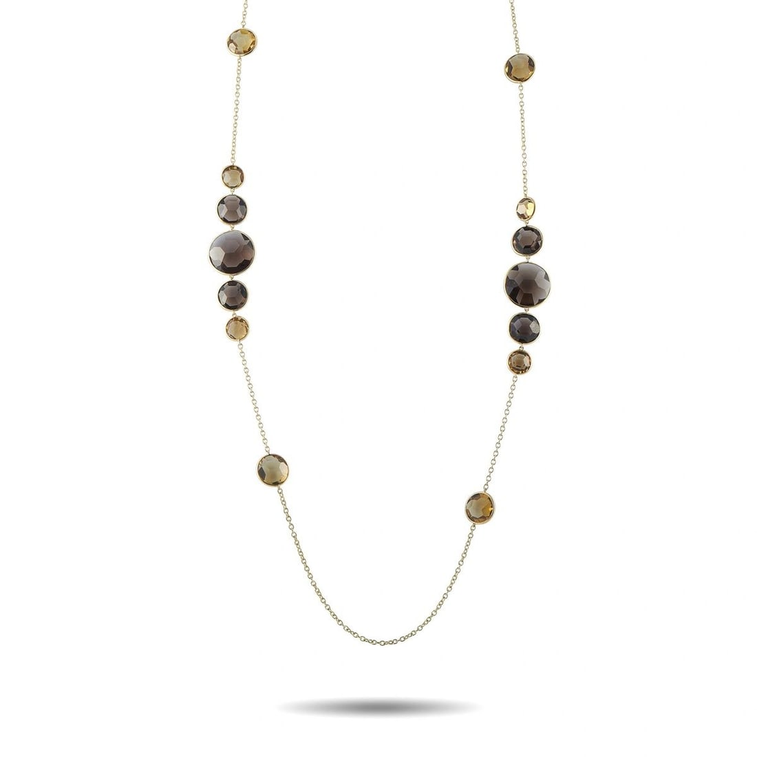 IPPOLITA 18K YELLOW GOLD SMOKY QUARTZ NECKLACE: Smoky Quartz gemstones in a range of colors add dimension to this exquisite Ippolita necklace. Simple and elegant, the 35 chain makes it a dramatic addition to any ensemble. Its crafted from 18K Yello