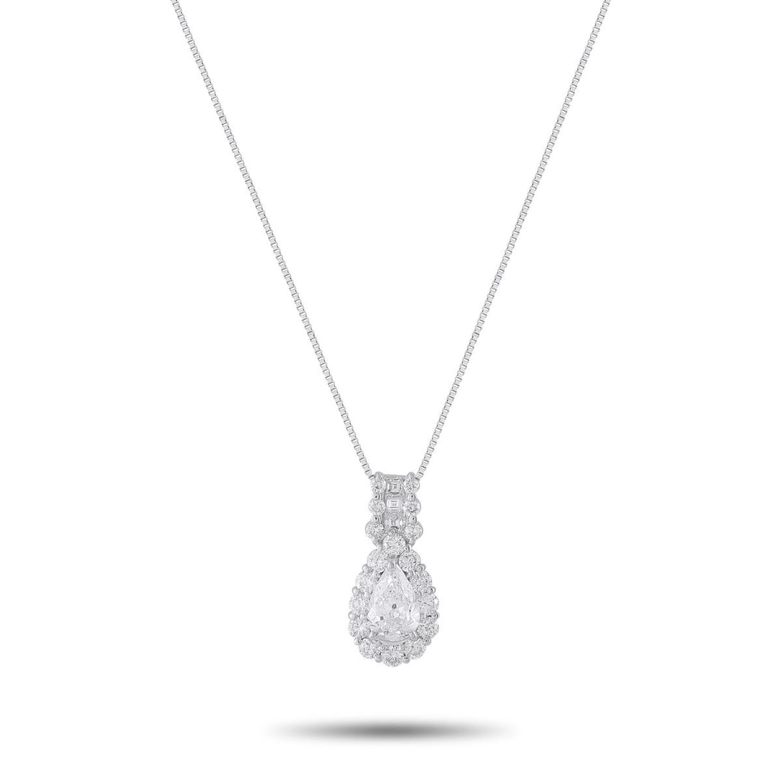 PLATINUM 1.98CT DIAMOND PENDANT NECKLACE: This breathtaking platinum diamond pendant necklace centers a pear-shaped diamond of approximately 1.0 carat, surrounded by a glittering halo of round brilliant diamonds and accented above by addition