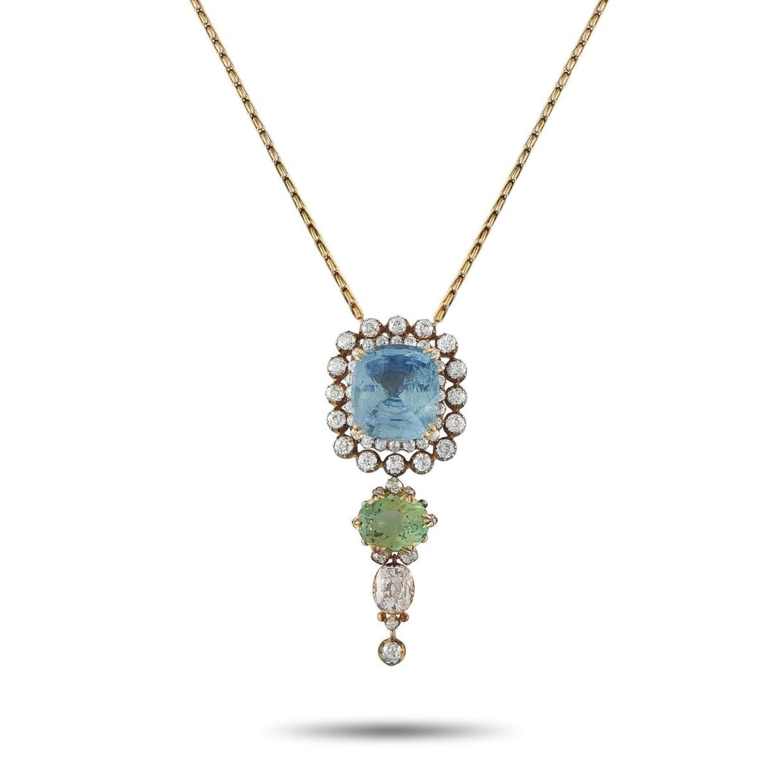 14K YELLOW GOLD 21CT BURMA NO HEAT SAPPHIRE, TOURMALINE, AND DIAMOND PENDANT NECKLACE: This extraordinary estate 14K yellow gold necklace features a magnificent cascading pendant of exceptional gemological depth and antique elegance. At the crown of the pendant, a large cushion-cut blue