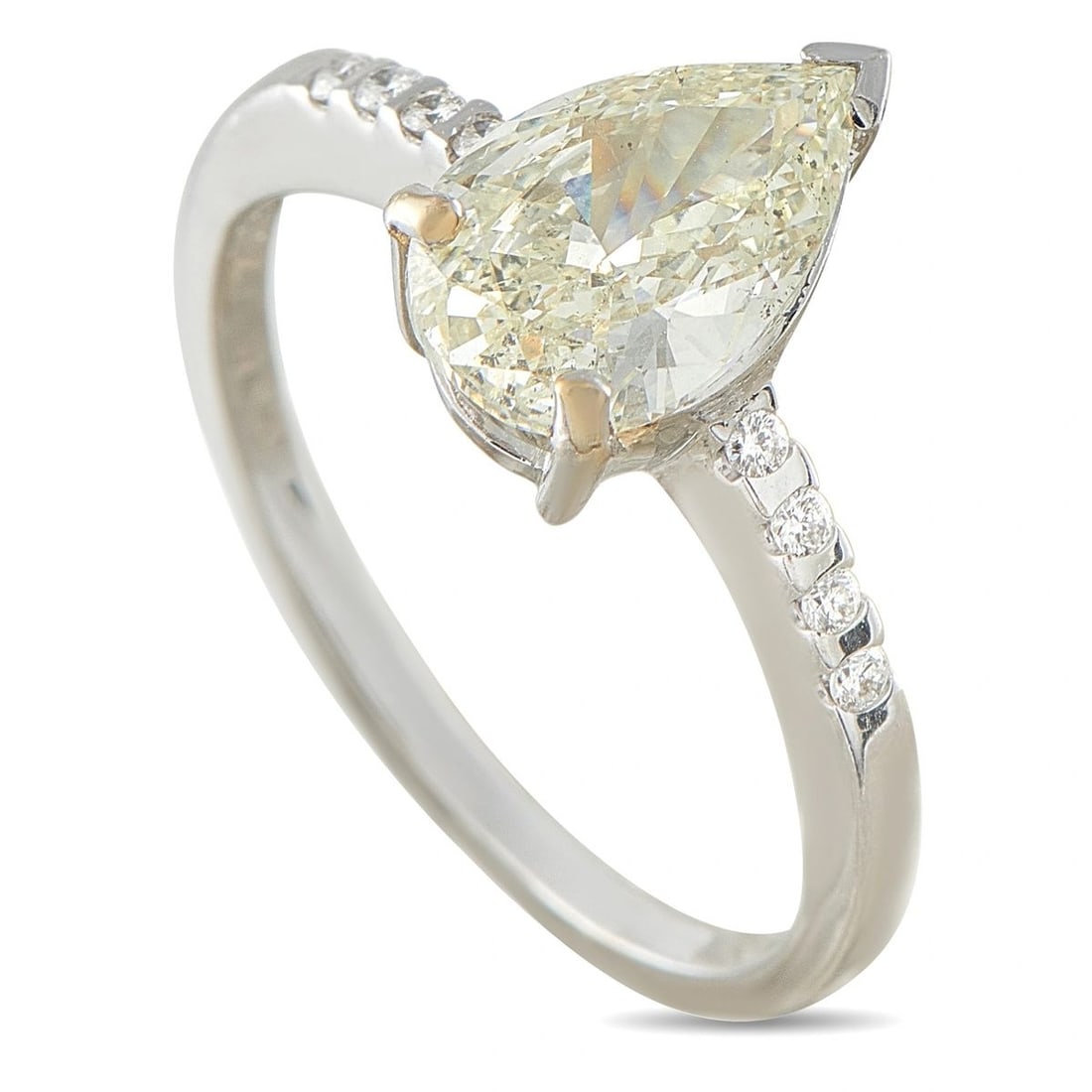 18K WHITE GOLD 1.58CT DIAMOND RING: This ring is crafted in 18K white gold and centers on a pear-shaped diamond weighing approximately 1.50 carats, accented by round diamonds totaling approximately 0.08 carats set along the shank. The c