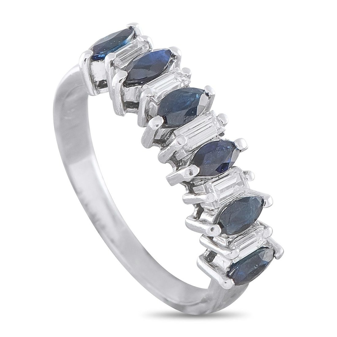 PLATINUM 0.25CT DIAMOND AND SAPPHIRE RING: An elegant estate platinum half-eternity band featuring an alternating pattern of marquise-cut deep blue sapphires and baguette-cut diamonds. The sapphires display a rich, velvety midnight blue hue, b