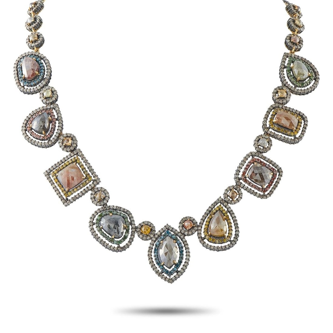 18K YELLOW GOLD 85CT DIAMOND NECKLACE: This statement necklace is crafted in 18K yellow gold with blackened detailing and is set with an array of fancy-colored rose-cut diamond slices in pear, oval, marquise, and cushion shapes, totaling a