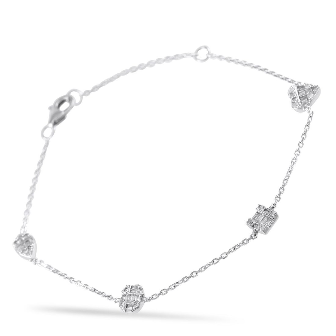 14K WHITE GOLD 0.40CT DIAMOND STATION BRACELET: Sparkling Diamond accents totaling 0.40 carats make this bracelet the perfect way to add a touch of luxury to any occasion. Simple, understated, and incredibly elegant, its crafted from 14K White Gold