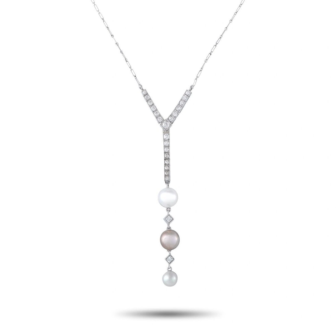 PLATINUM 18K WHITE GOLD 0.85CT DIAMOND AND PEARL VINTAGE PENDANT NECKLACE: This vintage French-style necklace is crafted in platinum with 18K white gold detailing, featuring a diamond-set Y-drop suspending three natural pearls in white and silvery-pink hues, separated by dia