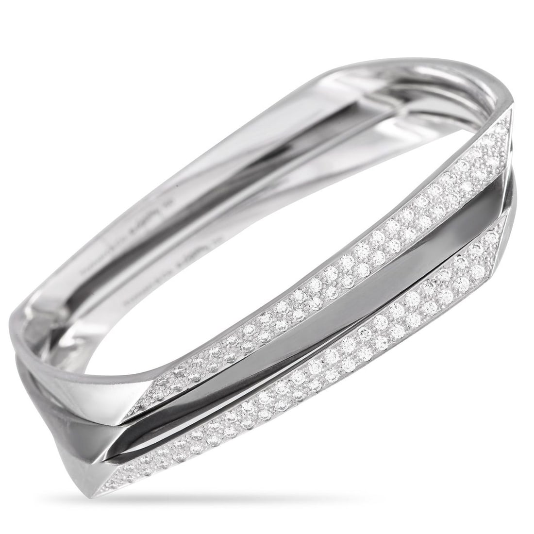 TIFFANY & CO. GEHRY 18K WHITE GOLD 1.20CT DIAMOND BRACELET SET: This Tiffany & Co. Gehry Bracelet Set features a trio of uniquely elegant 18K White Gold bangle bracelets. Meant to be worn together as a stacked set, each piece features clean lines and a distinctly 