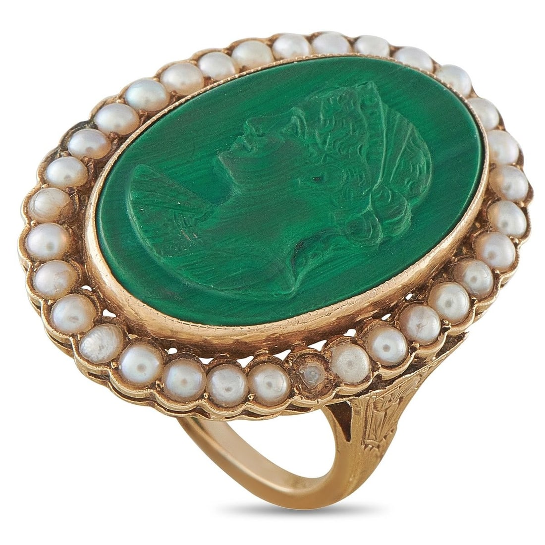 ANTIQUE 14K YELLOW GOLD MALACHITE AND SEED PEARL CAMEO RING: This ring is crafted in 14K yellow gold and features a hand-carved Victorian-era malachite cameo framed by a halo of seed pearls, with delicate hand-engraved shoulders. Please note one small seed pear