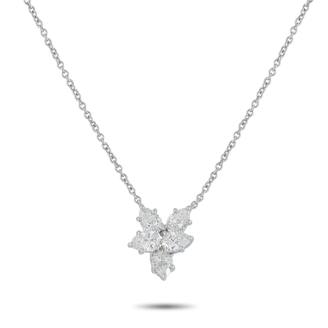HARRY WINSTON PLATINUM 1.0CT DIAMOND NECKLACE: Add timeless luxury to any ensemble with this classic Harry Winston necklace. A cluster of Diamonds with a total weight of 1.0 carats effortlessly catch the light along with your every movement. Set i