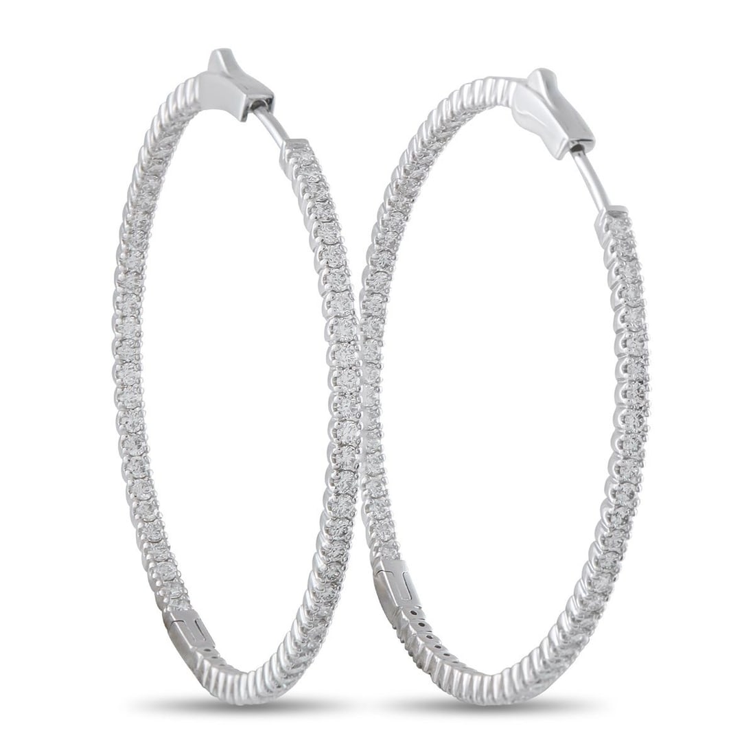 14K WHITE GOLD 2.02CT DIAMOND INSIDE-OUT HOOP EARRINGS: These dazzling hoop earrings will put the perfect finishing touch on any ensemble. Sleek and stylish, the classic design comes to life thanks to sparkling Diamonds with a total weight of 2.02 carats. 