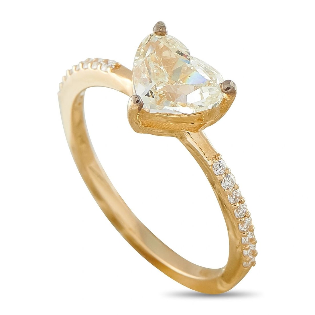 18K YELLOW GOLD 1.47CT DIAMOND RING: This ring is crafted in 18K yellow gold and features a heart-shaped diamond center stone weighing approximately 1.37 carats, graded L color and SI1 clarity. The band is lined with round diamonds total