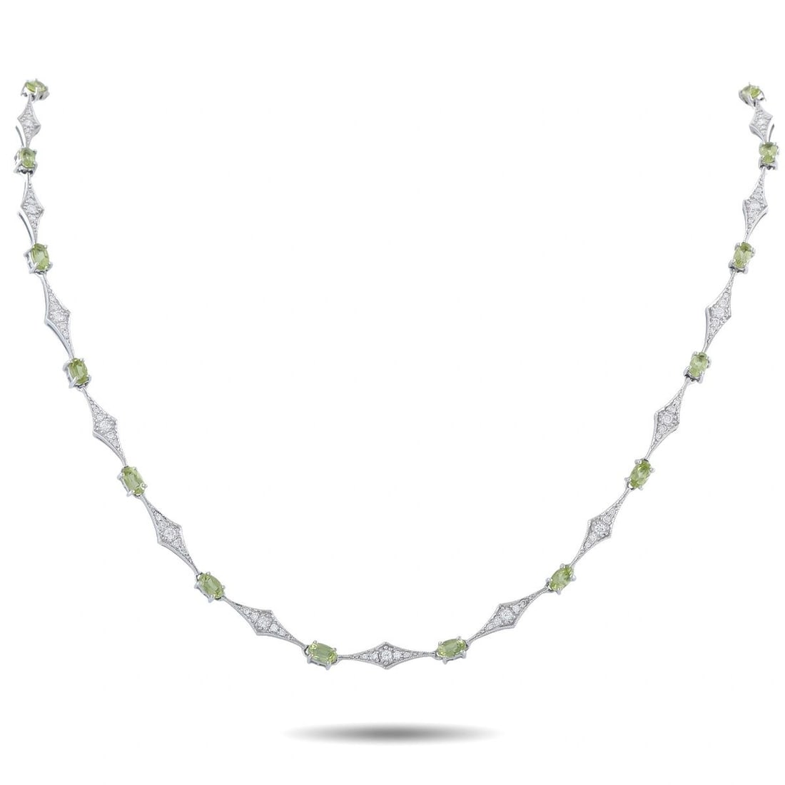 LAURA MUNDER 18K WHITE GOLD 1.20CT DIAMOND AND PERIDOT STATION NECKLACE: A contemporary station necklace in 18K white gold by Laura Munder, set with vivid oval-cut peridots and round brilliant diamonds totaling approximately 1.20 carats. The design alternates prong-set ova