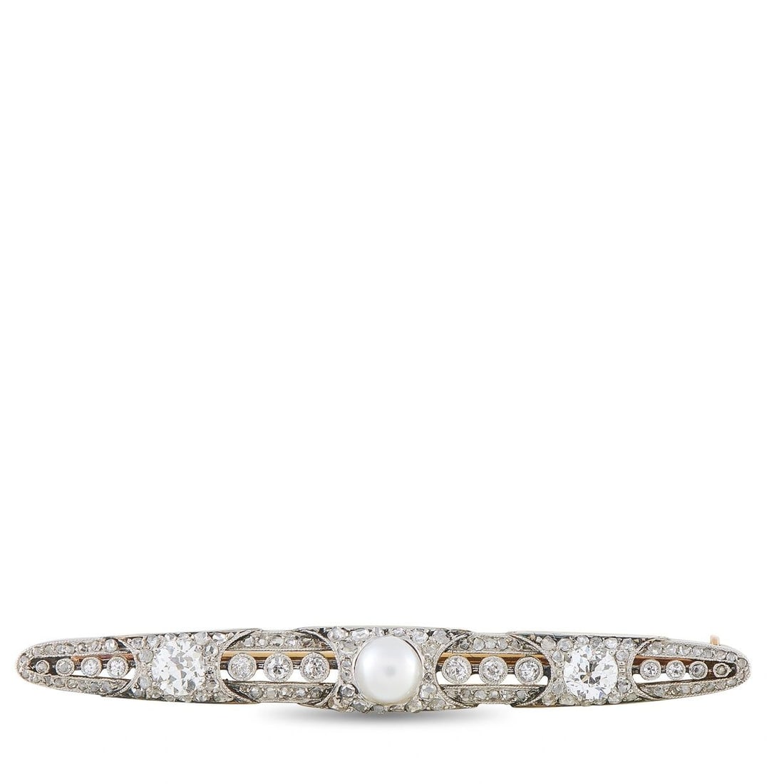 PLATINUM 1.0CT DIAMOND AND PEARL BROOCH: A sleek, streamlined design makes this luxury brooch incredibly chic. Set in Platinum, sparkling Diamonds with a total weight of 1.0 carats allow it to seemingly radiate light. Pearl accents provide t
