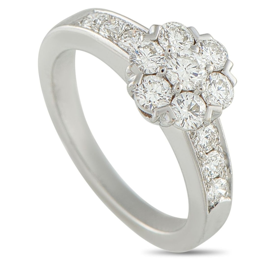 VAN CLEEF & ARPELS FLEURETTE 18K WHITE GOLD DIAMOND RING: This Van Cleef & Arpels Fleurette ring is a luxury piece that is ideal for everyday wear. Sparkling Diamonds are beautifully showcased by this pieces sleek 18K White Gold setting. It features a 2mm wi